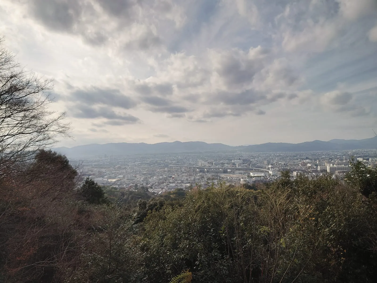 Kyoto seen from the path up Mount Inari on a winter afternoon, December 30, 2024